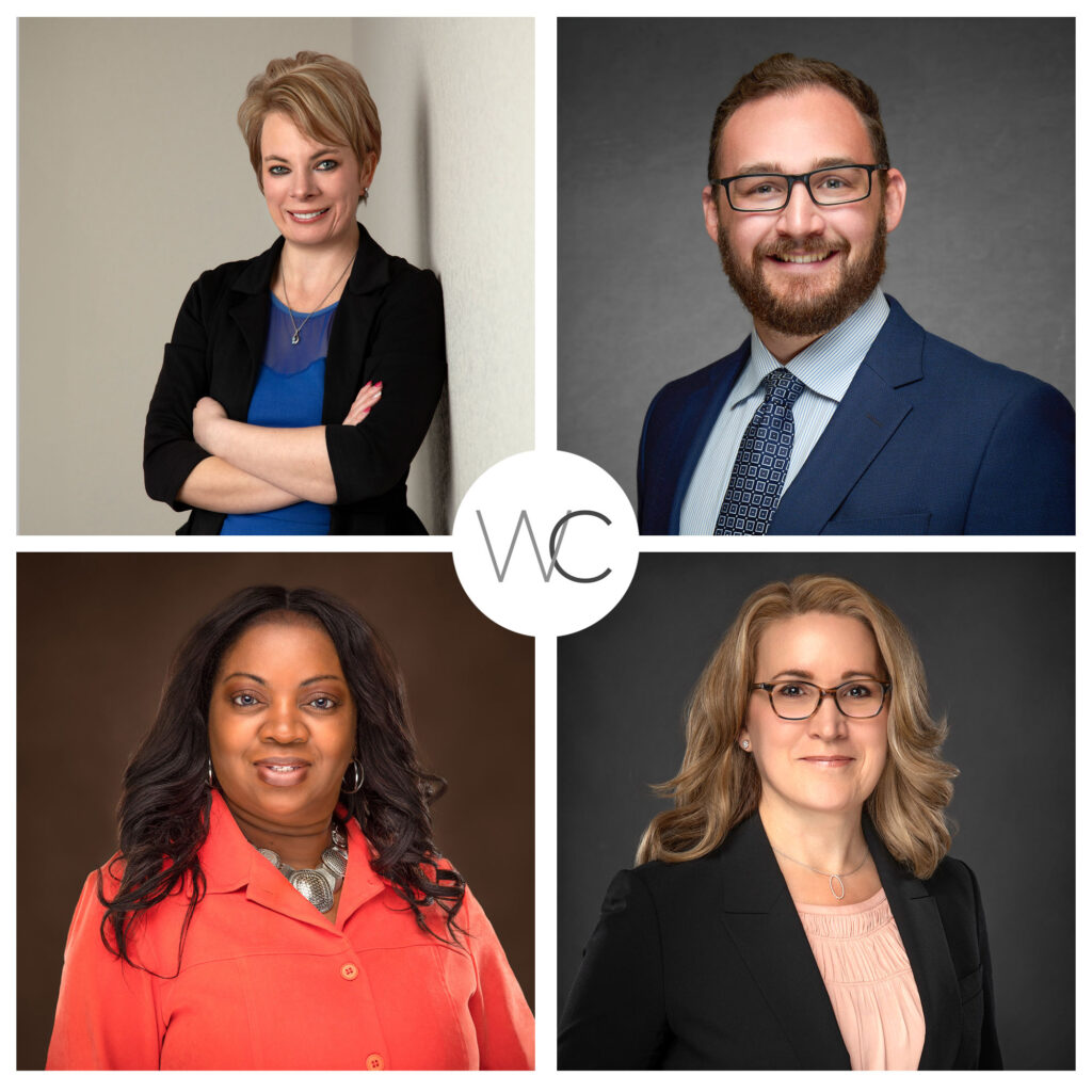 Four professional headshots of diverse individuals, two women and two men, dressed in business attire, against neutral backgrounds.