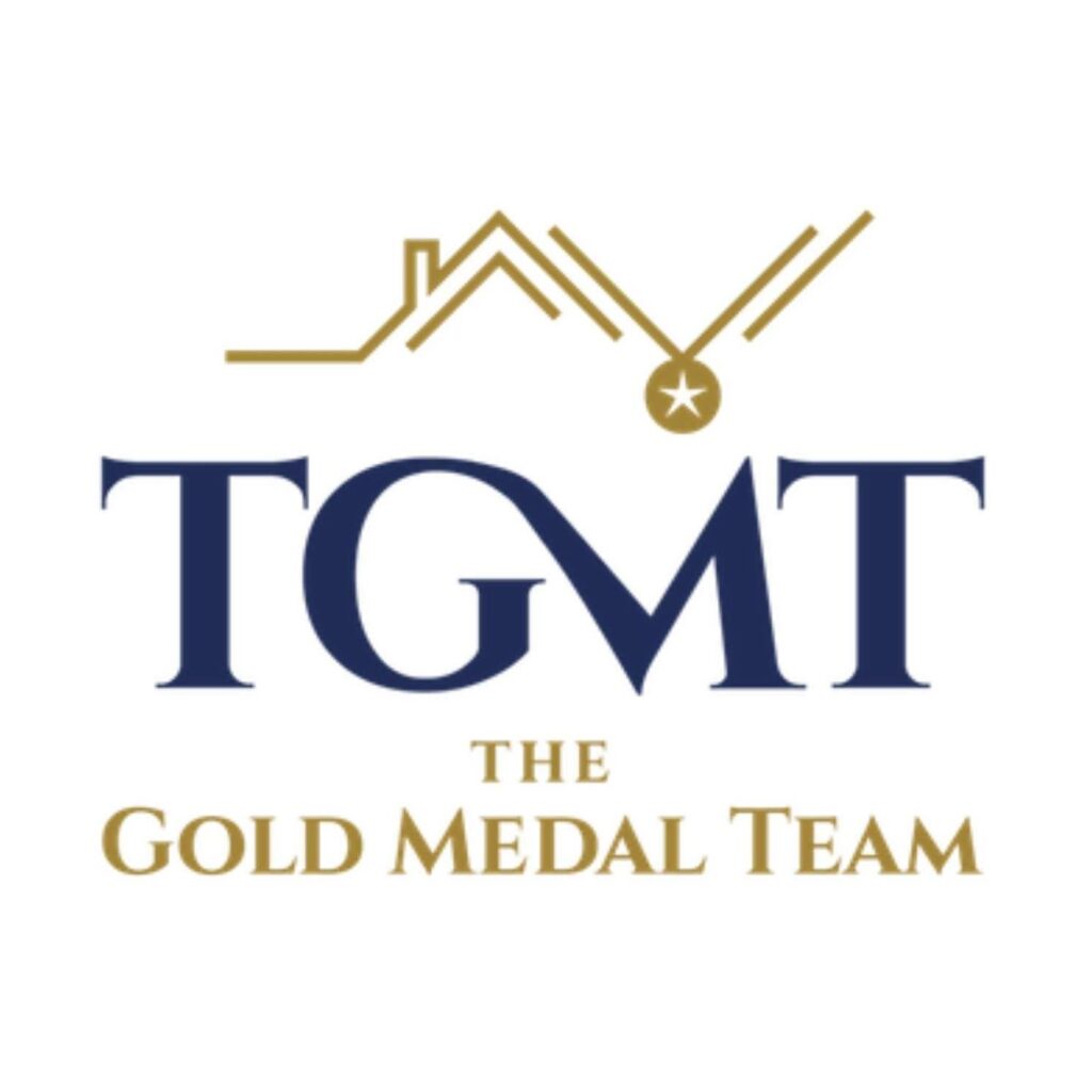 Logo featuring the letters "TGMT" with a roof and medal design above, and the text "The Gold Medal Team" below in gold and blue.