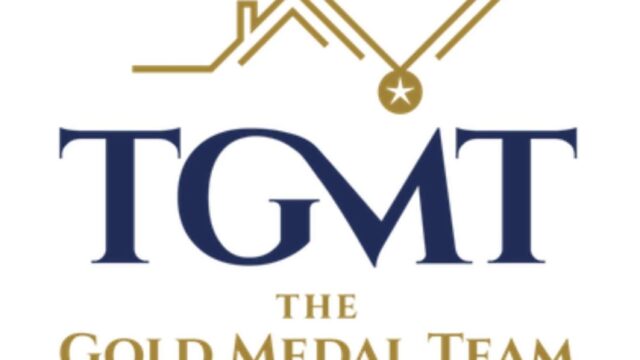 Logo featuring the letters "TGMT" with a roof and medal design above, and the text "The Gold Medal Team" below in gold and blue.